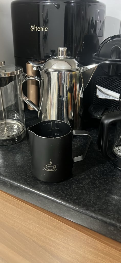 X4 Milk jug ,X2 Black Cafetiere coffee Espresso jug and tea pots all together