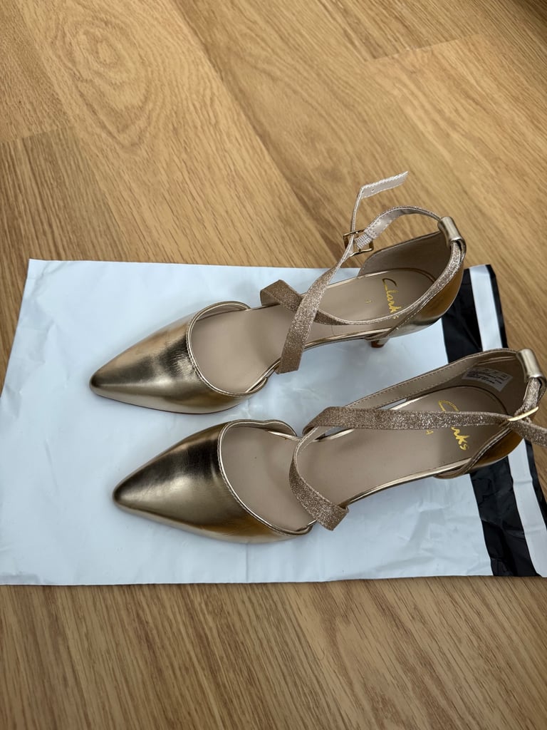 Clarks gold coloured pointed heels 