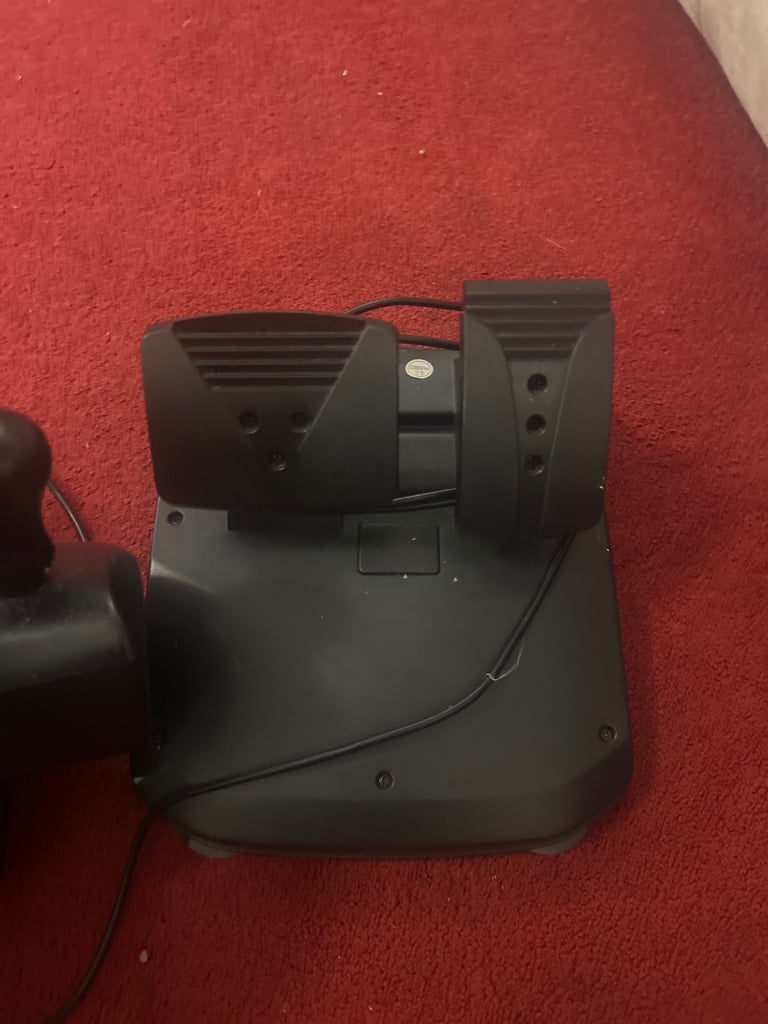 Racing steering wheel and peddles