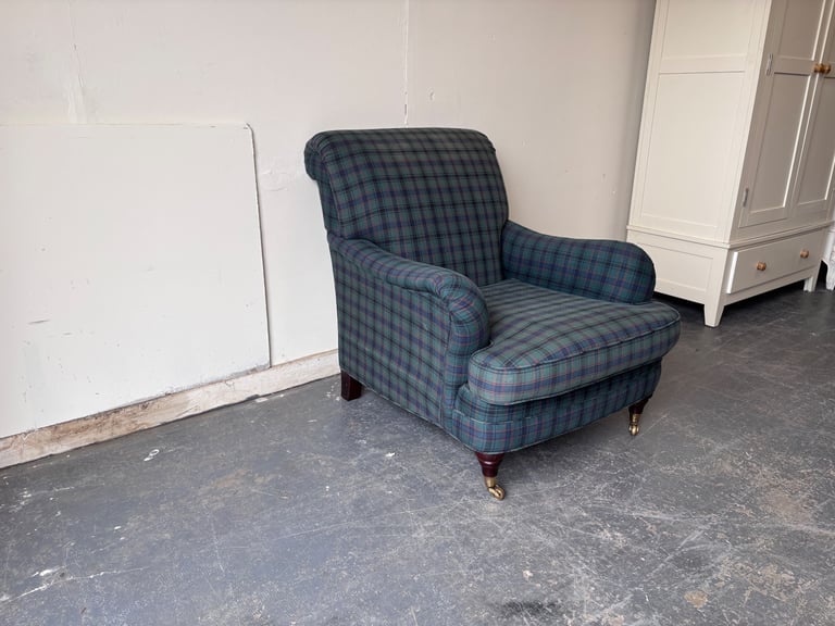 Marks and Spencer classic club chair with brass castors ! 