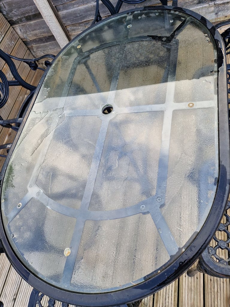 Cast iron table & chairs