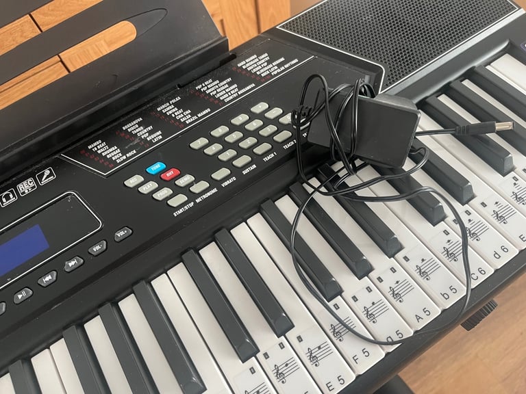 Electric keyboard stand stool headphones 