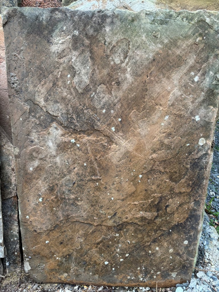 Reclaimed sandstone paving slabs. Approx 23sq metres