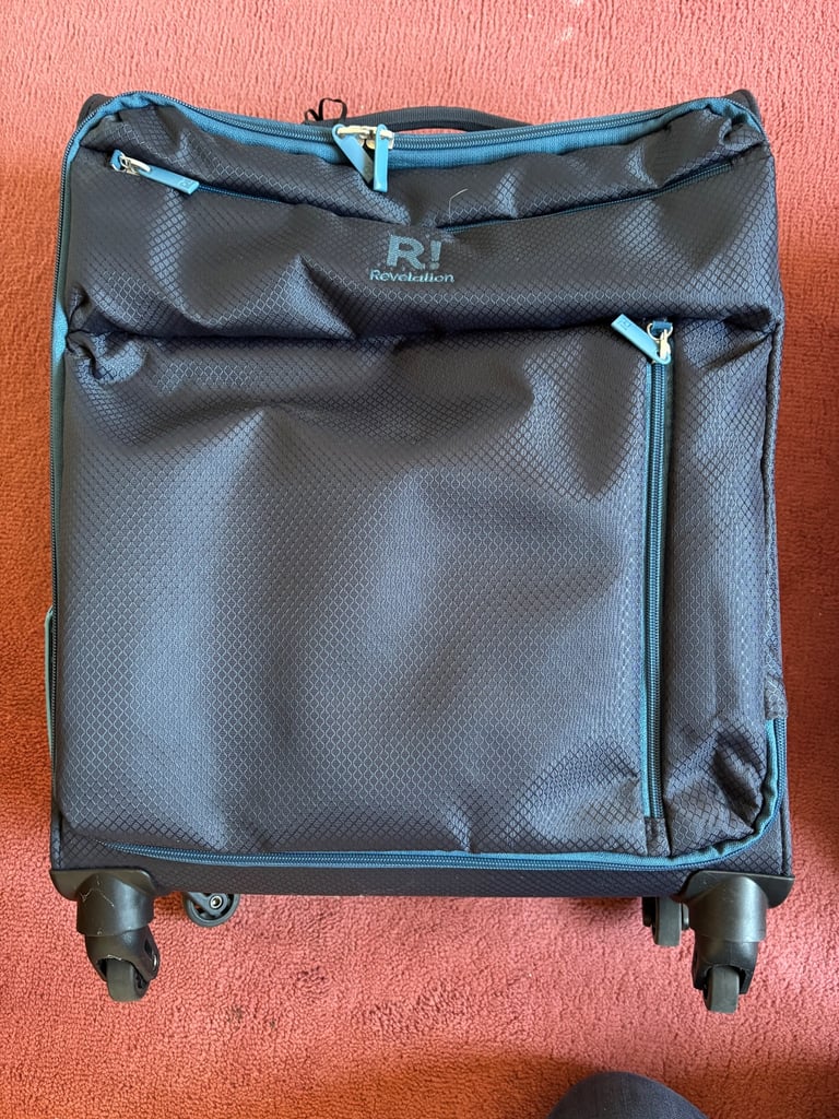 Small suitcase with wheels and extending handle