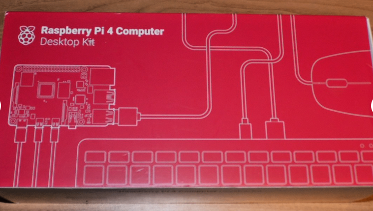 image for OFFICIAL RASPBERRY Pi 4 COMPUTER DESKTOP KIT 4GB UK EDITION SC0400UK START UP