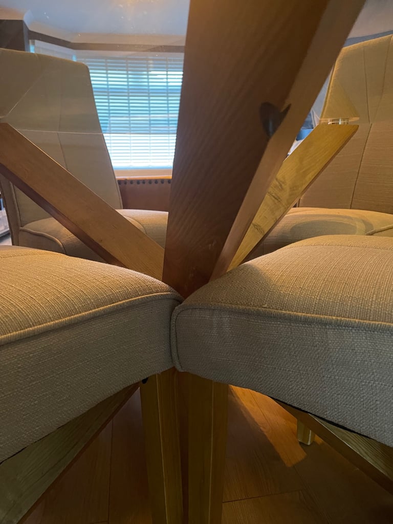 Oak and glass dining table and four chairs