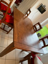 Solid oak dining table and 6 chairs