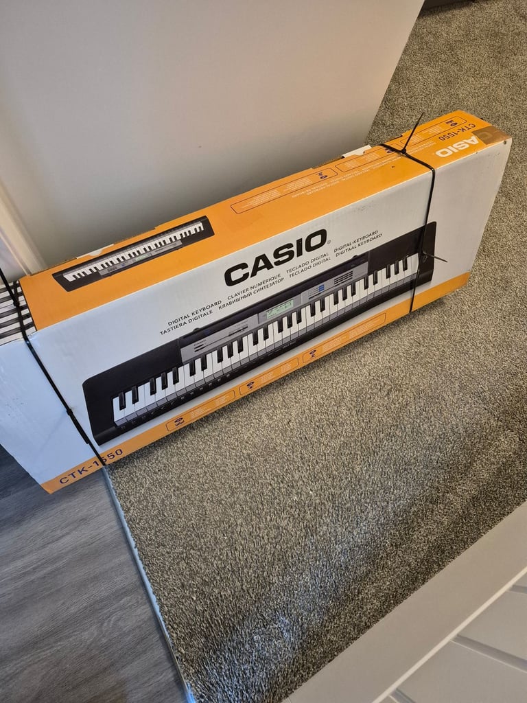 image for Casio keyboard,stand & headphones