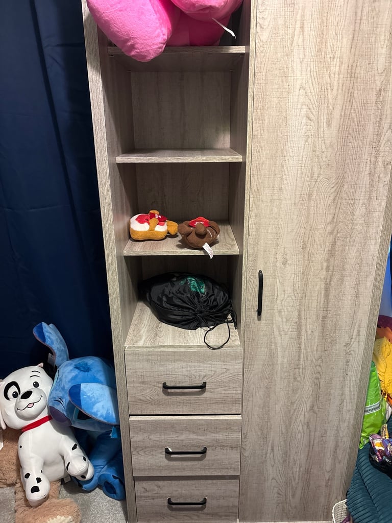 Wardrobe with shelves,drawers and rail