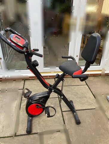 Exercise bike with back rest and resistance bands in Stourbridge