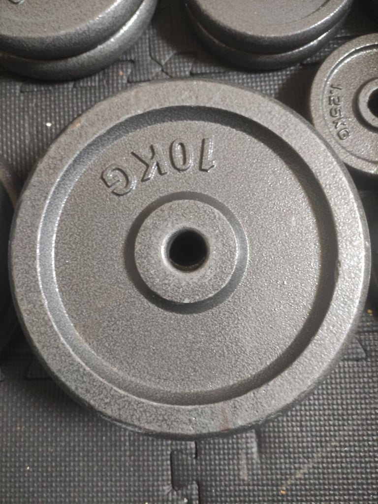 Cast iron plates total 114kg + 1.8m bar