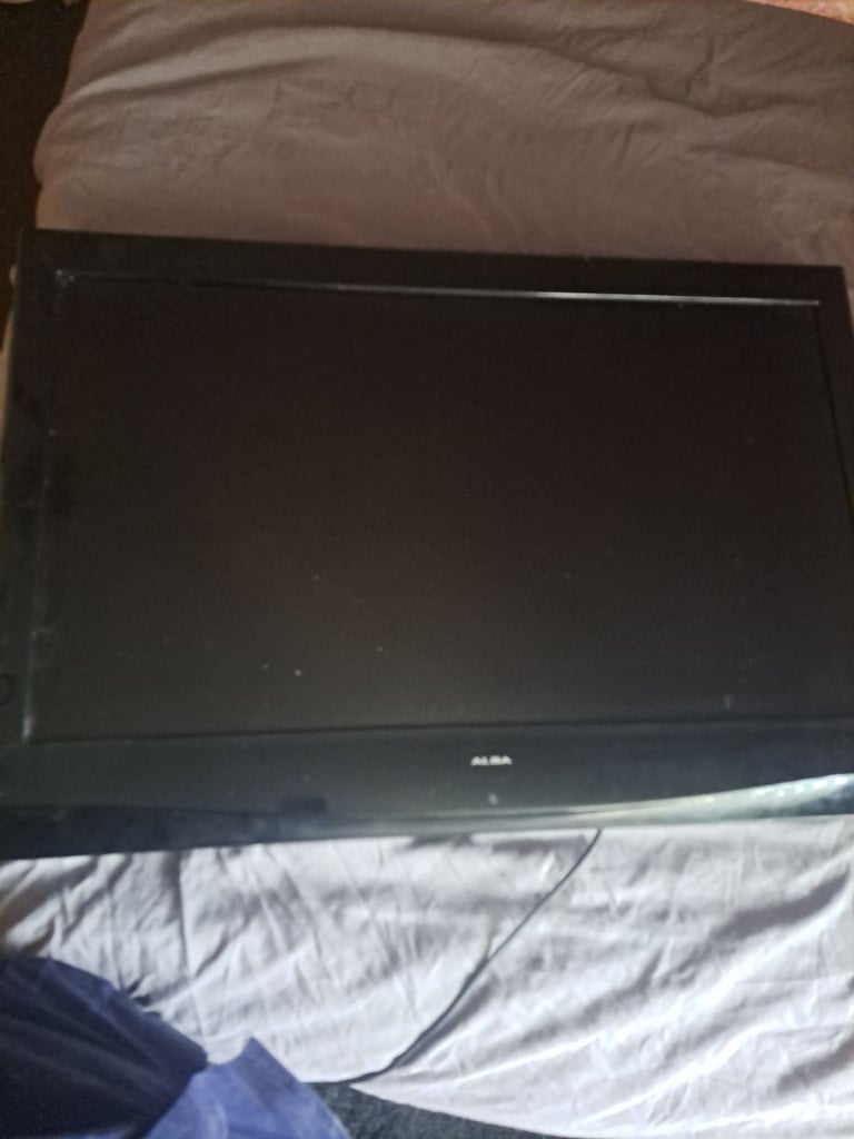 image for Tv think its 32 inch works good been on the wall 