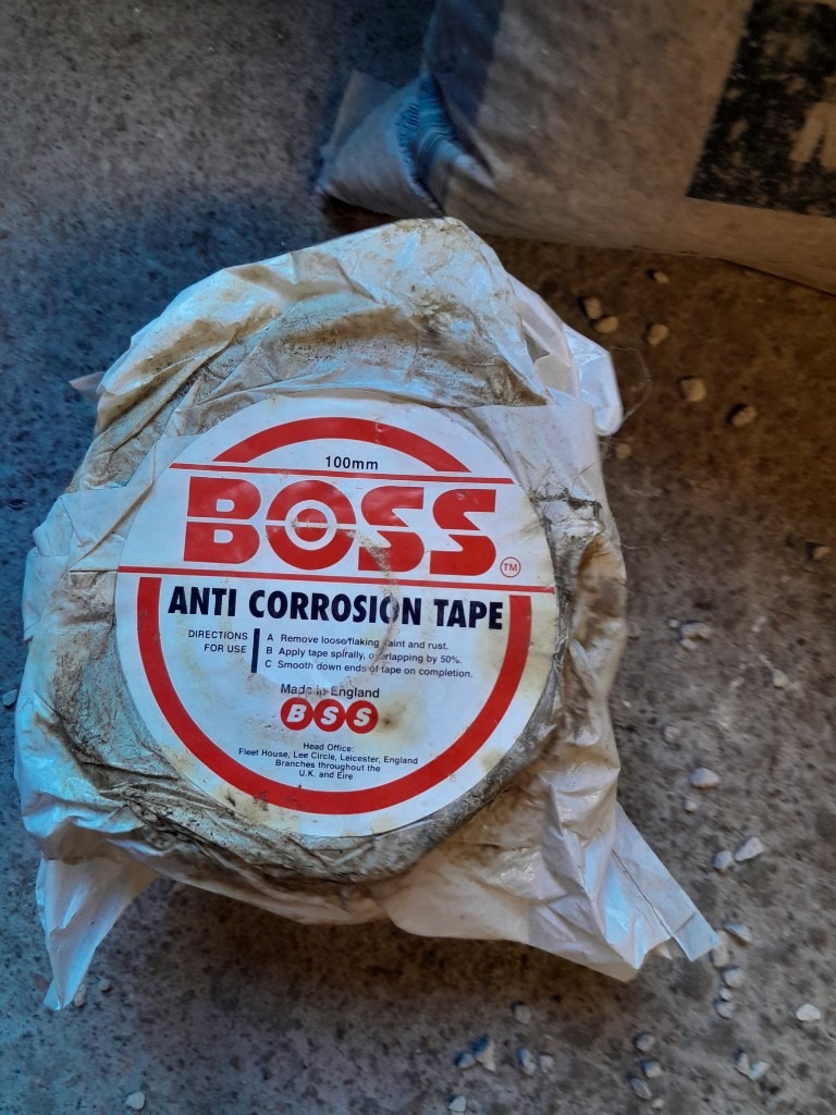 Full Roll Denso Protective Tape and Nearly Full bag Of Lime Soakaway Chippings