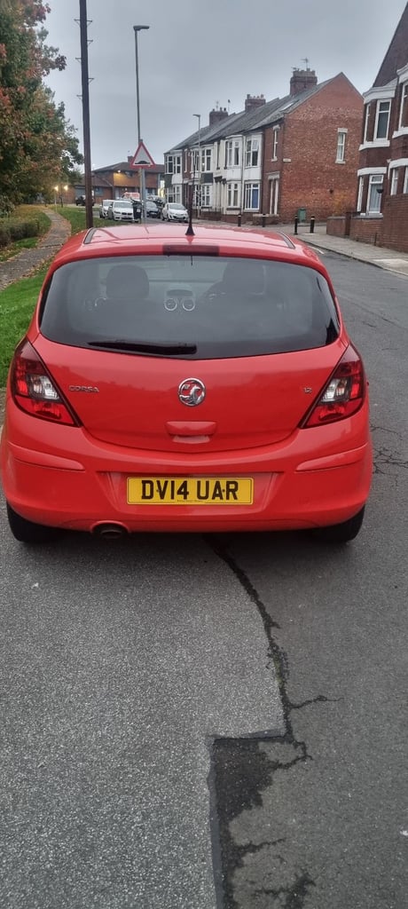 Vauxhall Corsa 1.2 sxi 5 door manual red  petrol hatch back