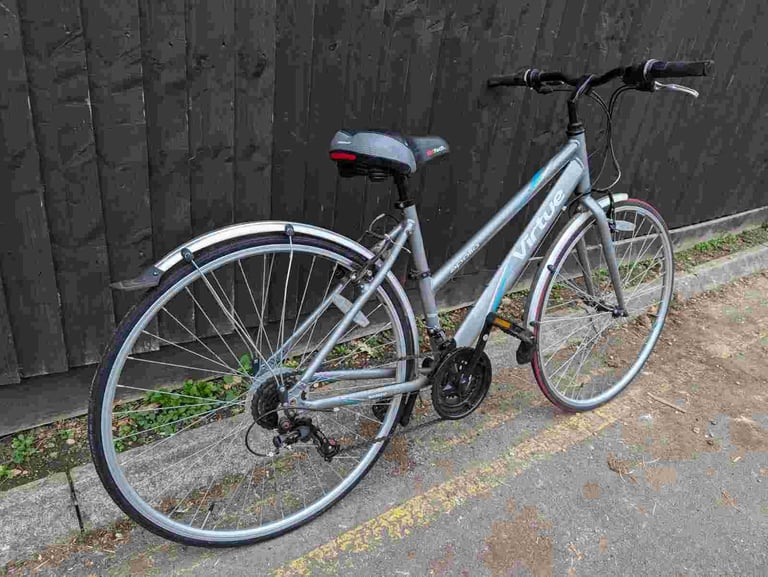 Apollo Virtue Hybrid Sport bike in good condition with mudguards and bell.