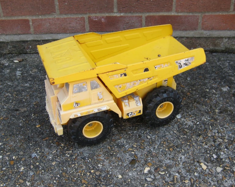 Caterpillar Toy Dumper Truck £1