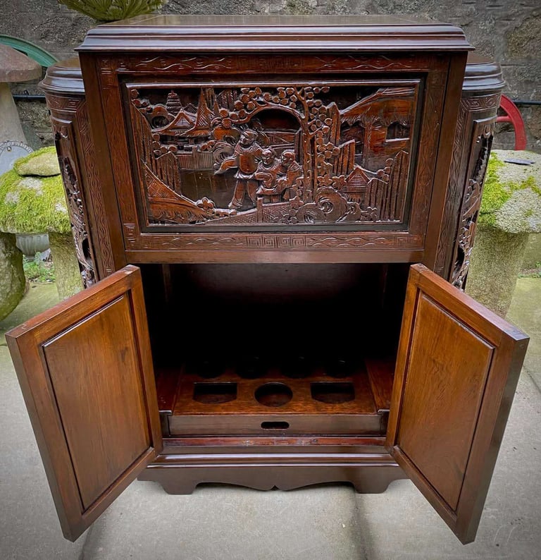 20th century Chinese heavily carved camphor wood cocktail bar cabinet