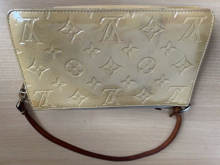 Louis Vuitton Beige Monogram Beige Remix Pochette Lexington handbag.