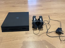 PlayStation 4 Pro with 1TB SSD upgrade and dock and Games 