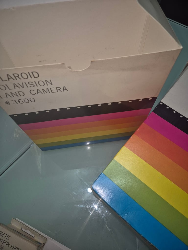 Polaroid land cameras and player screen