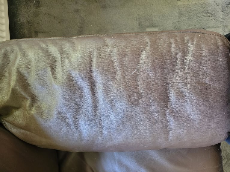 Small brown leather sofa- free