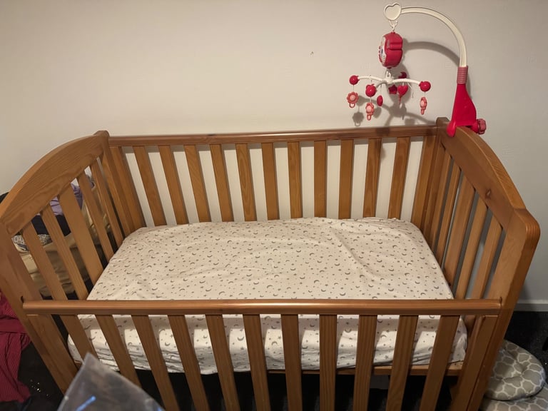 image for Baby cot with mattress 