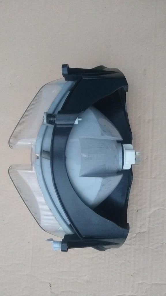 PGO T-Rex moped scooter headlight, new condition.