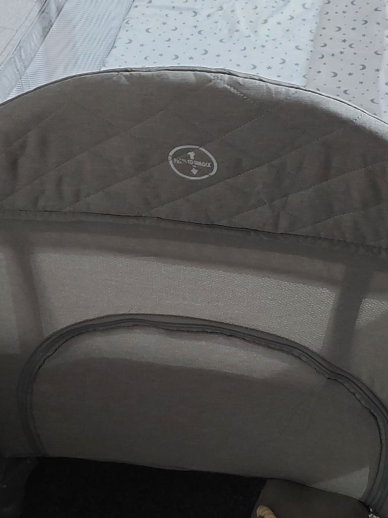 Brand new travel cot