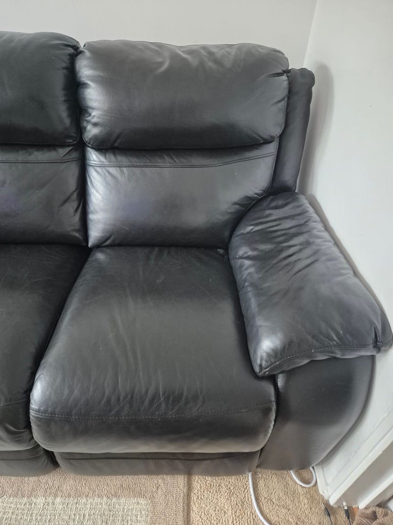 Two seater leather reclining sofa