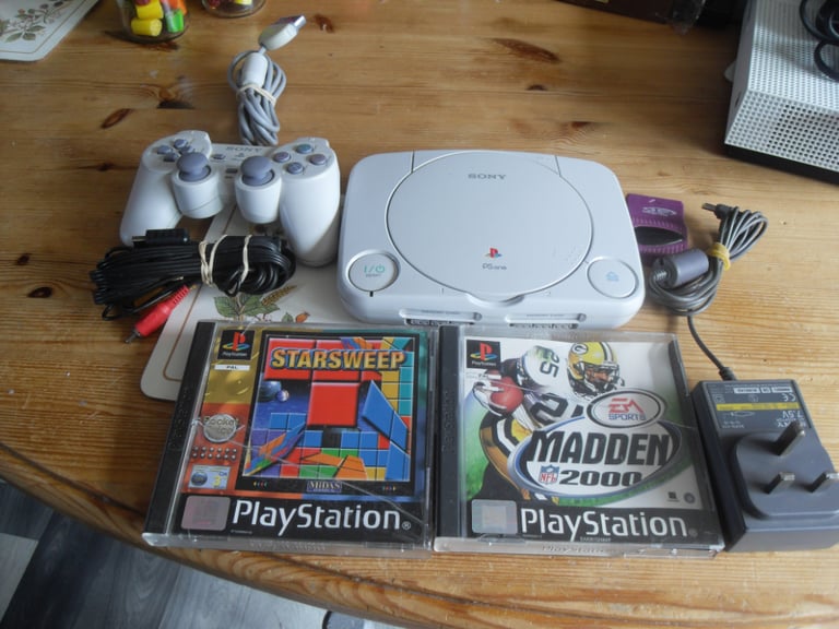 working slim playstation one with games memory card
