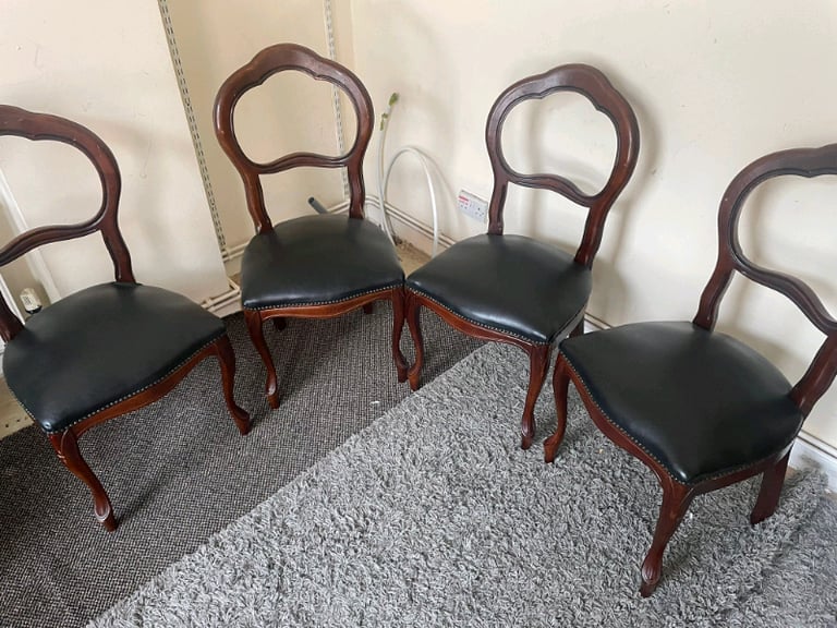 Oakwood and leather dining chairs £75