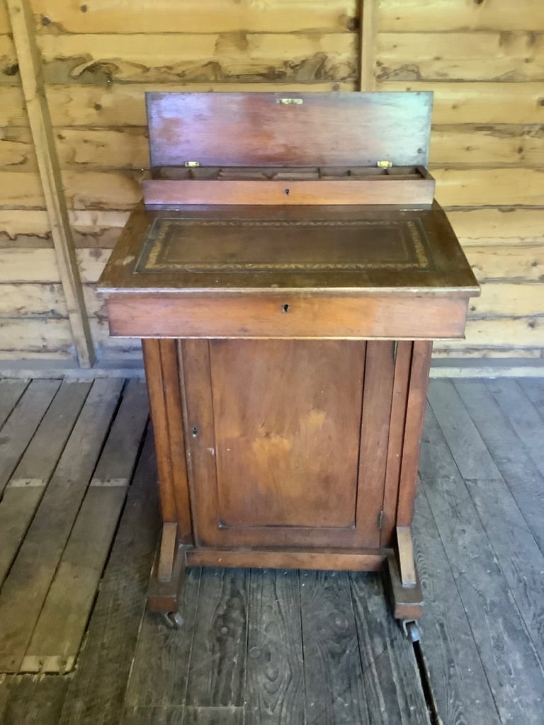 Victorian walnut brown leather insert davenport with ink wells & wheel castors