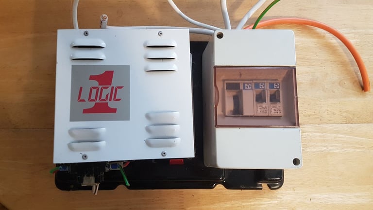 LOGIC 1 power supply and battery charger with panel control for camper, caravan, motorhome or boat.