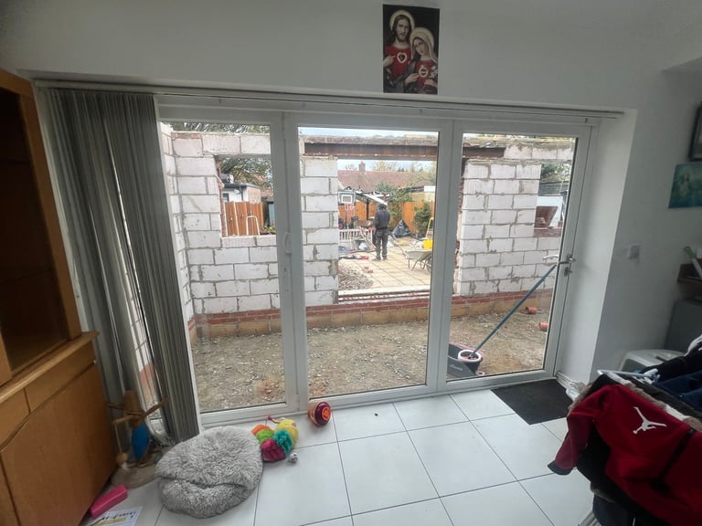 Home Renovation Deal Kitchen Drawers. Bi-folding door and a window  