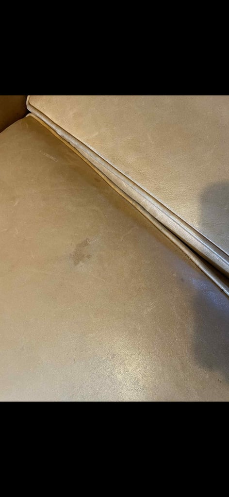 Tan Chesterfield sofa  and footstool 