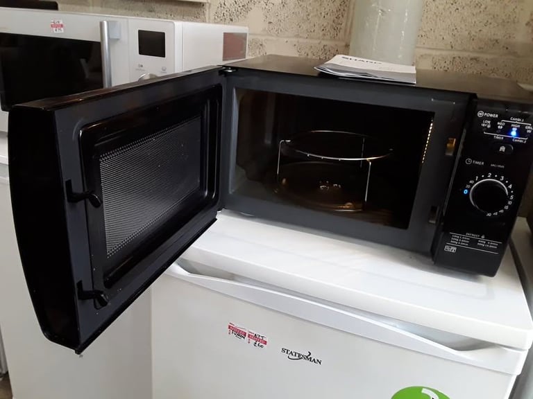 Black Sharp YCGG02 microwave oven & grill Low Cost Moves 2nd Hand Furniture STALYBRIDGE SK15 3DN