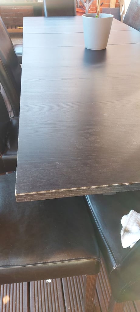 Large table and 12 brown chairs