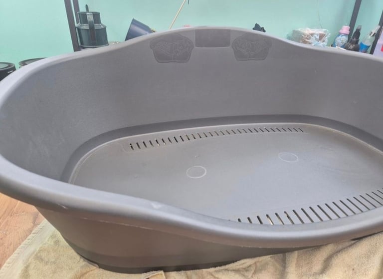 Large plastic dog bed