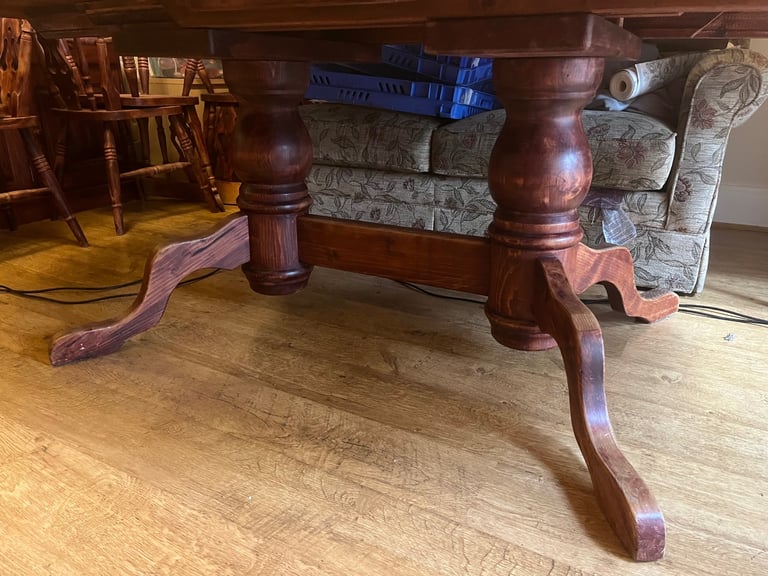 Large extendable solid wood dining table and 8 chairs