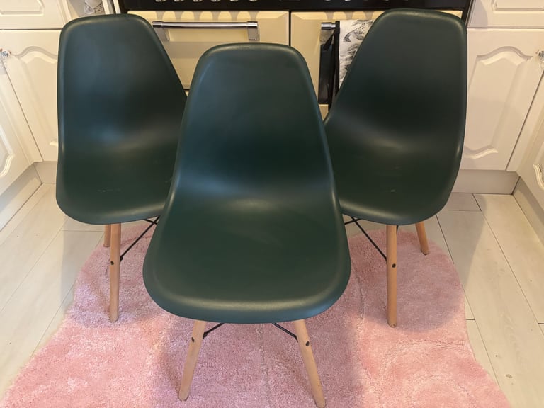 Three green chairs 