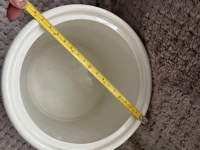 White ceramic jar with lid