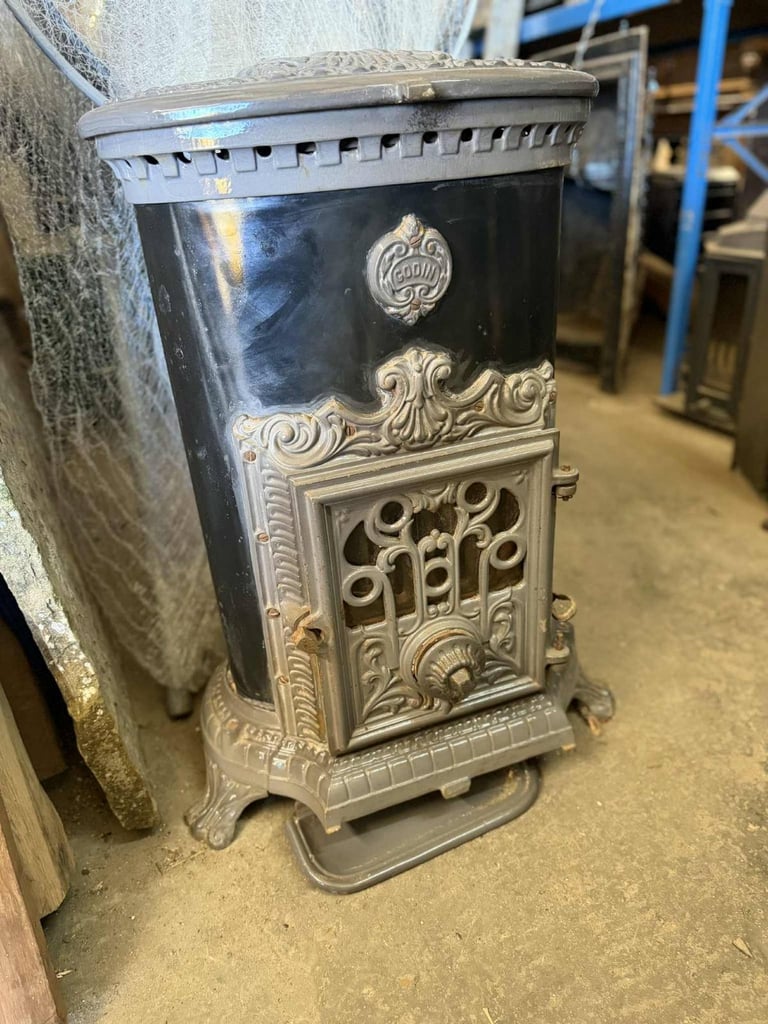 Secondhand Cast Iron Wood / Coal Burning Stove