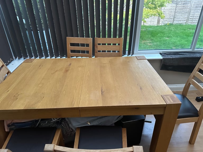 image for Dining table and chairs