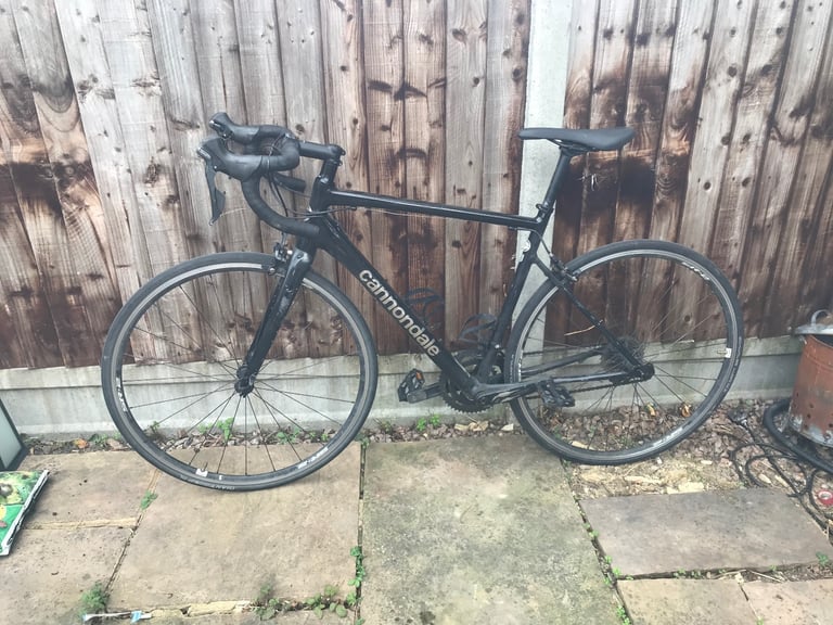 image for Cannondale optimo road bike size 54cm frame in colour black for sale bicycle
