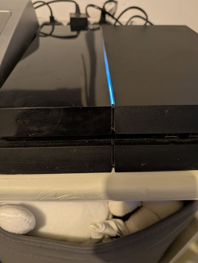 image for Ps4 with red controller, brand new worms game and second hand red dead redemption 2 games 