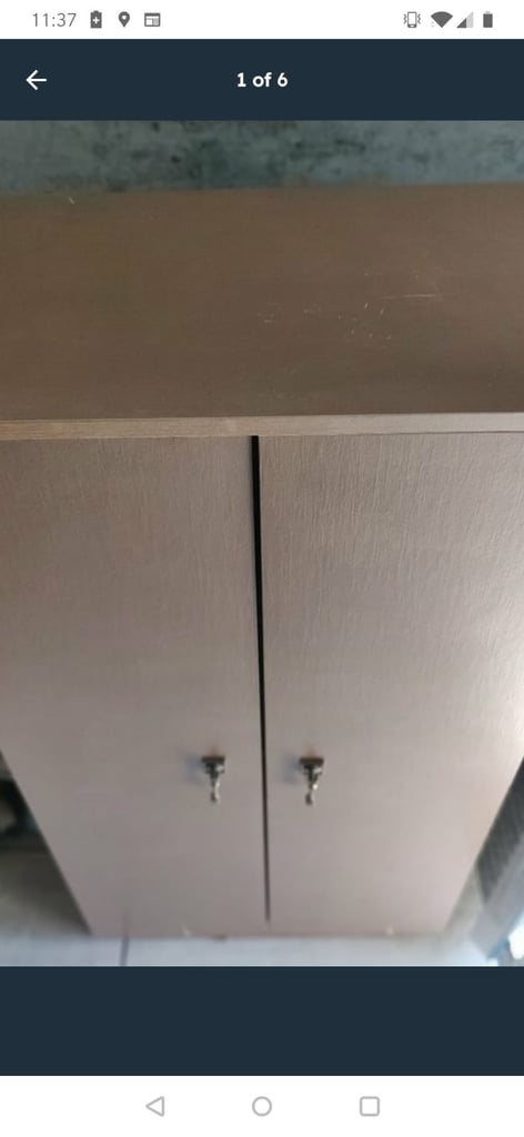 Rose gold wooden cabinet with 7 adjustable shelves handy for storage