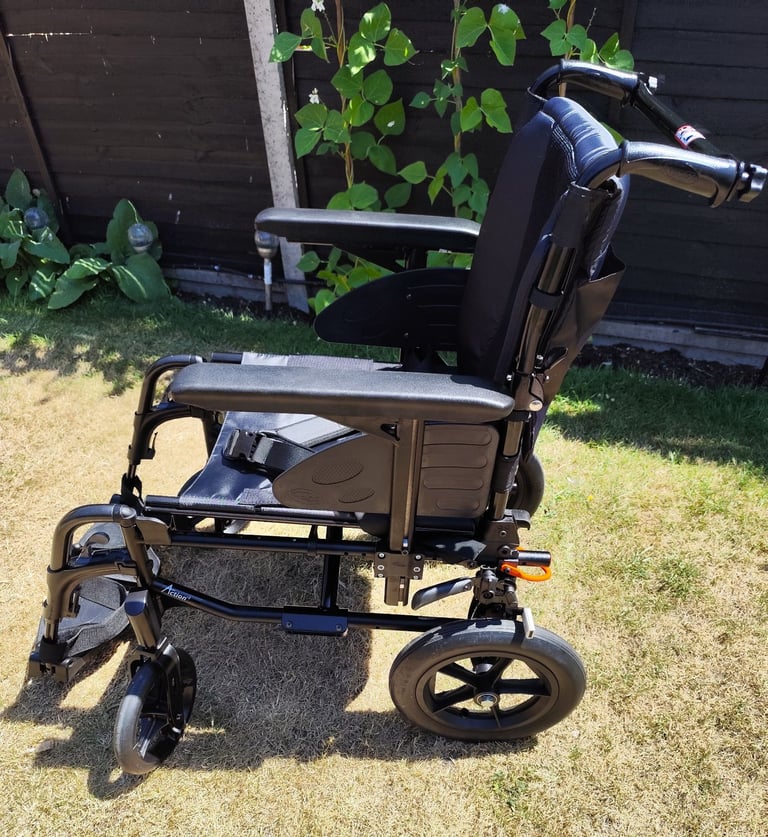 User assisted Wheelchair in good clean condition.