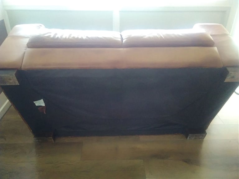 £20 two seater Buffalo Hide ( leather ) sofa with fire safety certificate 