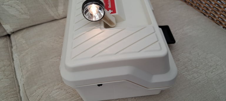 LLOYDS PHARMACY FIRST AID MEDICINE BOX.WITH TORCH AND LIGHT INSIDE AS NEW