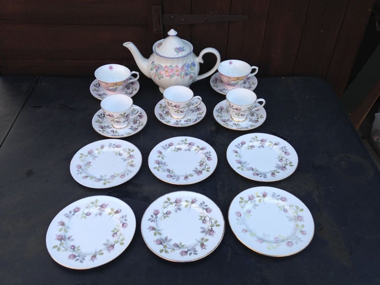 China tea pot , cups , saucers plates , set 